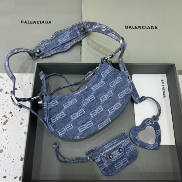 desc_balenciaga-le-cagole-xs-shoulder-bag-bb-monogram-bleached-denim-in-blue--26126cm_1